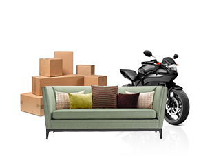 Boxes, couch and small motorcycle